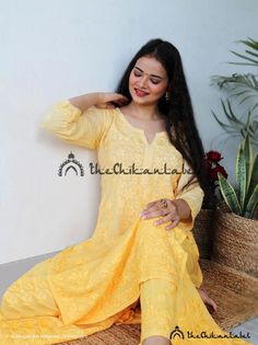 Thechikanlabel yellow cotton kurta sharara set lucknawi chikankari kurtaDisclaimer : : Motifs of embroidery may vary as the images shown are for illustration purpose.PRODUCT SPECIFICATIONSKurti Fabric : Chanderi CottonSleeves : 3/4 SleevesStyle : Straight KurtiLength : 44-46 InchesOccasions : Casual Wear, Office Wear, Festive WearGarment Care : Hand Wash OnlyPrice Includes : As per choicePRODUCT FEATURESFlawless finishingElegant looksAlluring patternsSoft and Skin friendlyBest for summers Trivia Unstitched Yellow Mulmul Sharara, Yellow Unstitched Mulmul Sharara, Yellow Mulmul Palazzo Set With Dabka Work, Yellow Palazzo Set With Dabka Work In Mulmul, Yellow Mulmul Sharara With Dabka Work, Yellow Sharara With Dabka Work In Mulmul, Yellow Mulmul Sharara For Festivals, Yellow Chikankari Embroidery Sharara For Eid, Yellow Cotton Anarkali Set With Self Design