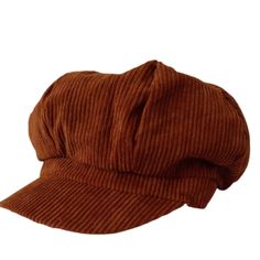 a brown hat on a white background