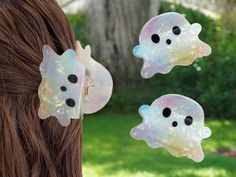 Get into the spooky spirit with this adorable Iridescent Ghost Hair Clip! This cute ghost-shaped clip is a must-have Halloween accessory, perfect for adding a playful touch to your hairstyle. Ideal for Halloween parties, trick-or-treating, or simply showing off your love for the holiday season! 👻 Height: 5.7 cm (2.2 inches) Width: 7.4 cm (2.91 inches) Ghost Hair, Claw Clip Hair, Halloween Hair Clips, Halloween Accessories Hair, Claw Hair Clips, Halloween Hair, Whimsical Fashion, Your Hairstyle, Clip Hair