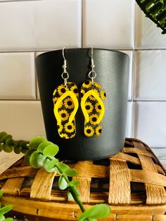 "What a cute way to show a little summer! Sunflower flip-flop acrylic earrings. Sterling Silver fish hook wires These earrings are laser cut on 1/8\" thick acrylic and are very lightweight. The dangle length is approx. 3\" **Check out our other wood and acrylic earrings too Any questions please send me a message! Thank you for viewing my item! Made in a smoke-free home, USA." Silver Flip Flops, Summer Sunflower, Vacation Jewelry, Engraved Ornaments, Wood And Acrylic, Mom Keychain, Engraved Keychain, Earrings Summer, Silver Fish