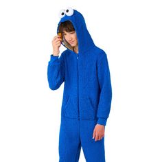 This kids' one-piece from OppoSuits is made from a soft huggable fabric that is perfect for lounging around and watching Sesame Street! This kids' one-piece from OppoSuits is made from a soft huggable fabric that is perfect for lounging around and watching Sesame Street! FEATURES Zipper neck closure and hood Long sleeves Loose fit 2 functional side pockets UnlinedFABRIC & CARE Polyester Machine wash Imported Size: 14. Color: Blue. Gender: male. Cookie Monster Onesie, Sesame Street Cookies, Sesame Street Cookie Monster, Zipper Neck, Kids Clothes Boys, One Piece Pajamas, Monster Design, Cookie Monster, Knit Shorts