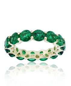 Bold in color, this eternity ring features a paved design with sparkling green cubic zirconias. Classic Emerald Jewelry With Halo, Macy's Oval Jewelry With Prong Setting, May Birthstone Jewelry With Vs Clarity Round Cut, Elegant Eternity Band For May Birthstone, Elegant Emerald Eternity Band With Prong Setting, Classic Infinity Jewelry With Prong Setting, Elegant Emerald Eternity Band, Elegant Green Round Eternity Band, Elegant Round Cut Emerald Eternity Band