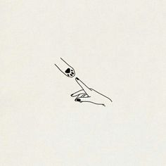 a drawing of a hand holding an object in the air with a skull on it