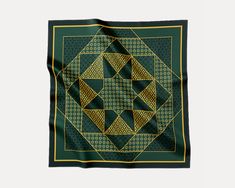 100% Silk Oeko-Tex Standard 100 🌱 Size: 107cm x 107cm Designed by Swiss Artist  This silk twill scarf is inspired by the tiles of the Dar El Bacha Museum in Marrakech. Patterns in deep greens and golden yellows are carefully combined to create an even larger pattern. It invites you to focus on the bigger picture while still enjoying the moment. It also celebrates the fascination for the color green and its many positive associations in different cultures. This signature piece is large enough to Green Hair Scarf, Boho Bandana, Enjoying The Moment, Green Silk Scarf, Silk Neck Scarf, Silk Bandana, Arabic Pattern, Silk Twill Scarf, Bigger Picture