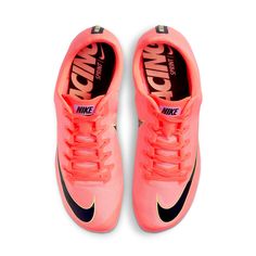 a pair of pink nike shoes on a white background