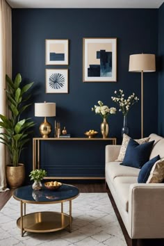 a living room with blue walls and gold accents on the coffee table in front of it