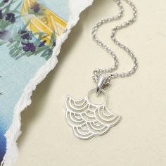 This gorgeous Sterling Silver River Ripples Necklace effortlessly captures the gentle ripple effect created on water when something is dropped in. For example, it could be a coin in a wishing well or a hand gently dipped in while boating on a lake A perfect necklace for adding a splash of summer to any outfit. Go on, treat someone or even treat yourself. Bubble Earrings, Ripple Effect, Triangle Necklace, Wishing Well, Silver Moon, Dainty Necklace, Chain Pendants, Boating, Free Jewelry