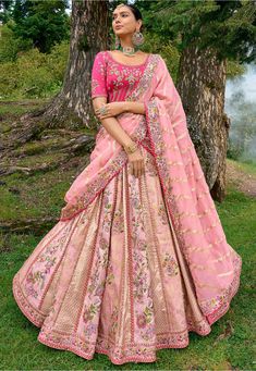 Art Silk Lehenga in Baby Pink This attire with Poly Shantoon Lining is Enhanced with Resham, Zari, Sequins, Stone Work and Zari Woven in Floral Motifs Available with a Semi-stitched Art Silk Choli in Pink and a Tissue Dupatta in Baby Pink. Crafted in Round Neck and Half Sleeve The Semi-stitched Lehenga Waist and Hips are customizable from 28 to 36 and 36 to 44 inches respectively and Its Length is 40 inches Do note: 1.)Accessories shown in the image are for presentation purposes only. 2.)Slight Sangeet Function, Heavy Lehenga, Choli Dress, Baby Pink Color, Nikkah Dress, Pink Lehenga, Baby Pink Colour, Designer Baby, Indian Lehenga