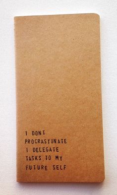 a notepad with writing on it that says i don't procrastinate i delegate tasks to my future self