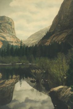 a mountain lake surrounded by trees and rocks