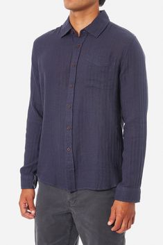 Crafted from a blend of soft cotton linen herringbone, the best-selling Alan Solid Shirt is now available in a long sleeve. Offering a comfortable, breathable feel and airy design, this shirt is perfect for a relaxed yet polished look. 52% cotton 48% linen herringbone Left chest pocket Garment washed Clean-finished interior seams *To ensure long-lasting quality, use gentle machine wash on cold and line dry Casual Navy Linen Top, Navy Long Sleeve Shirt With Relaxed Fit, Polished Look, Chest Pocket, Cotton Linen, Light Gray, Herringbone, Light Grey, Long Lasting