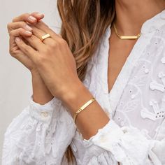 Add a personal touch to this edgy, engravable tag bracelet. Product Details Engravable 6 1/4" chain + 1" extender Total length 7 1/4" 3/16" wide chain Bar 1 3/8" by 3/16" Spring ring closure Engraving component 18k gold vermeil All other hardware 18k gold plated brass Avoid contact with anything containing derivatives of alcohol Inappropriate Language We are unable to process any engraving request containing profanities or inappropriate language. Where possible, we will contact you to seek an al White Aura, Black Labradorite, Island Fashion, Orange Agate, Yellow Opal, Iridescent Crystal, Pink Enamel, Blue Lace Agate, London Blue