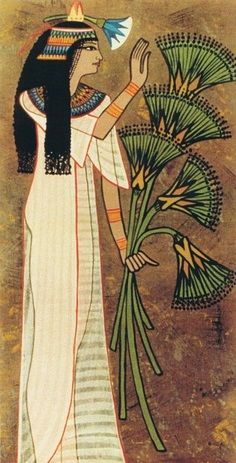 an egyptian woman holding flowers in her hand