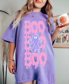 👻 Comfort Colors Halloween Boo Tee Shirt | Trendy 90s Cute Colorful Pastel Pinkoween Soft Women's T-shirt for Spooky Season 👻 Get ready for Spooky Season with this cute and fun girly ghost tee featuring a retro groovy ghost throwing a peace sign in front of wavy drippy BOOs! This Comfort Colors 1717 garment-dyed t-shirt is made 100% with ring-spun cotton. The soft-washed, garment-dyed fabric brings extra coziness to your wardrobe while the relaxed fit makes it perfect for enjoying Halloween in Girly Ghost, Groovy Ghost, 90s Halloween, Ghost Tee, Retro Groovy, Cute Pastel, Rose Pastel, Halloween Boo, Dyed Fabric