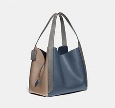 Coach Colorblock Hadley Hobo Dark Denim/Multi Tote Bag NEW Style: Hobo Bag Lining Color: Blue Bag Height: 11" Exterior Color: Denim Product Line: Coach Hadley Hobo Theme: Classic, Designer Pattern: Solid Features: Inner Pockets Exterior Material: Leather Closure: Magnetic Bag Depth: 7" Bag Width: 12.25" Bag Lining, Hobo Tote Bag, Coach Leather, Exterior Colors, Dark Denim, Blue Bags, Hobo Bag, Bucket Bag, Color Blocking