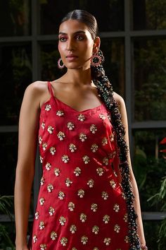 Red sleeveless kurti with all over Damask fiore motif embroidery using pearls, sequin and beads highlights. Paired with a shell shaped sequin embellished sheer skirt. - Aza Fashions Bollywood Style Hand Embellished Dresses, Hand Embellished Bollywood Dresses, Embellished Dress For Navratri Festival, Embellished Dress For Festive Navratri Season, Sleeveless Silk Dress For Diwali, Hand Embellished Dresses For Navratri Party, Hand Embellished Party Dresses For Navratri, Elegant Sleeveless Dress For Diwali, Festive Embellished Dresses