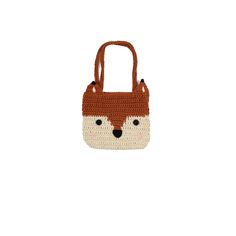 a crocheted bag with a fox face on it