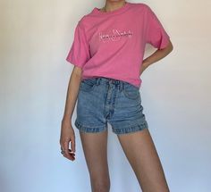 "Product Details: Vintage bright pink \"Hey Y'all\" t-shirt. Tuck into your favourite pair of jeans or throw over a bathing suit for summer! Brand: Gildan Material: 100% Cotton Marked Size: M Measurements: Width: 19.5' Length: 26' Neck Drop: 2.5' Amazing condition. Model: 5'9\" All sales are final." Pink Y2k Style T-shirt For Summer, 90s Style Pink T-shirt With Slogan, 90s Slogan Pink T-shirt, 90s Inspired Pink T-shirt For Spring, Pink Relaxed Fit T-shirt Y2k Style, Relaxed Fit Pink T-shirt Y2k Style, Pink Y2k Style Relaxed Fit T-shirt, Pink Relaxed Fit Y2k T-shirt, 90s Inspired Short Sleeve Summer T-shirt