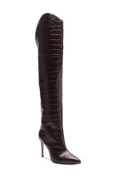 Allover croc embossing adds distinctive character to an over-the-knee boot fashioned with a pointy toe and sleek stiletto heel. 3 1/2" heel, 16 1/2" shaft, 14" circumference (size 8.5) Leather upper, lining and sole Made in Brazil Knee Boot, Shoe Boutique, Fabric Gift Bags, Stiletto Heel, Over The Knee Boots, Over The Knee, Emboss, Fashion Boots, Dark Chocolate