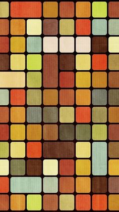 an abstract pattern with squares and rectangles in brown, orange, yellow, green, red