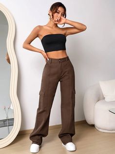 Elevate your denim game with our High Waist Cargo Jeans. These jeans feature a high waistline that flatters your figure and adds a trendy touch. With cargo-style pockets, they offer both style and functionality. Made from premium denim, these jeans provide comfort, durability, and a fashion-forward look. Perfect for adding an edgy twist to your casual outfits, our High Waist Cargo Jeans are a must-have in your wardrobe. Details: Color: Brown Pattern Type: Plain Type: Wide Leg Jeans Style: Cargo Trendy Straight Leg Non-stretch Cargo Jeans, Trendy Non-stretch Straight Leg Cargo Jeans, Non-stretch Trendy Full Length Cargo Jeans, Baggy Mid-rise Cargo Jeans For Fall, Brown Utility Straight Leg Jeans, Brown Cargo Jeans For Fall, Non-stretch High-rise Cargo Jeans, Non-stretch High Waist Cargo Jeans, High Waist Non-stretch Cargo Jeans With Pockets