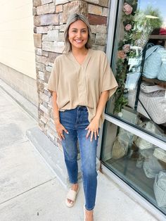 Step into comfort and style with our Retreat Yourself Tunic Top. Featuring a trendy V-neck and loose, short sleeves, this oversize tunic top is perfect for a day of relaxation or a night out. Embrace the freedom and embrace yourself with this must-have addition to your wardrobe! V-Neckline Short Sleeve Oversized Tunic Crystal is wearing a size large! Esme is wearing a size small! Chic Relaxed Fit V-neck Top For Day Out, Relaxed V-neck Blouse For Day Out, Spring Relaxed Fit V-neck Top For Day Out, Spring V-neck Top For Day Out With Relaxed Fit, Spring V-neck Top For Day Out, Effortless V-neck Blouse For Day Out, Relaxed V-neck Blouse For Vacation, Relaxed Fit V-neck Blouse For Day Out, Trendy Short Sleeve V-neck Top For Fall