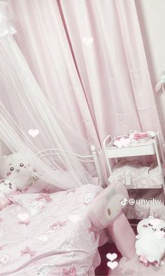 a bedroom with pink walls and white furniture, including a small bed covered in hearts