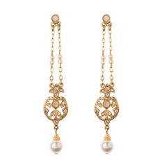 Channel elegance with our Grecia Earrings, adorned with delicate Czech glass pearl accents and shimmering crystals. These drop-down earrings are plated in 24K gold and feature a standard post back. All jewelry is handcrafted and made to order in our New York City design studio. Please allow 7-14 business days for production from the order date. Measurements: 0.6" W x 3" L Gold Clip-on Bridal Drop Earrings, Gold Linear Earrings With Pearl Charm For Wedding, Elegant Gold Clip-on Chandelier Earrings, Gold Teardrop Clip-on Chandelier Earrings, Gold Pearl Chandelier Earrings For Evenings, Elegant Jeweled Crystal Earrings Gold Plated, Elegant Gold-plated Chandelier Earrings With Pearl Drop, Gold Teardrop Chandelier Clip-on Earrings, Elegant Gold Chandelier Earrings With Pearl Chain