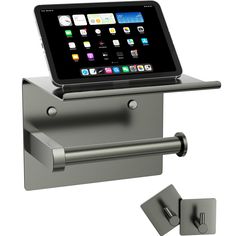 an ipad is sitting on top of a tablet holder with two magnets attached to it