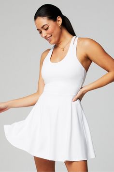 Boost Performance Dress Fabletics white/white female Activewear >> Womens >> One-Pieces regular Tennis Built-in Bra/Hidden Pockets/Removable Bra Cups Fitted White Tennis Dress For Sports, Stretch Tennis Dress With Built-in Bra For Spring, Fitted Spring Tennis Dress In Athleisure Style, Fitted Tennis Dress In Athleisure Style For Spring, Fitted Tennis Dress For Spring In Athleisure Style, White Sleeveless Summer Activewear, 4-way Stretch Tennis Dress For Summer Workouts, Summer Workout Tennis Dress With 4-way Stretch, Summer Tennis Dress With 4-way Stretch For Workout