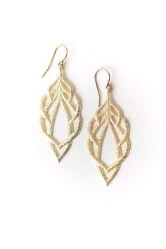 Reminiscent of textured leaves, brushed gold is used in this handcrafted artisan design. They dangle from gold filled ear wires just over two inches. Matte Gold Plated Brass (nickel and lead-safe) 2.25", with gold filled ear wires We hand select our natural materials, thus there may be slight variations in color and/or size that will not detract from the overall aesthetic Our unique handcrafted designer jewelry for women is made in America, each design created individually in our personal design Gold Leaf-shaped Nickel-free Earrings, Elegant Gold Leaf-shaped Jewelry, Textured Drop Earrings For Gifts, Gold Leaf Shaped Metal Jewelry, Gold Hypoallergenic Teardrop Chandelier Earrings, Textured Gold Jewelry For Gifts, Elegant Leaf-shaped Metal Earrings, Textured Gold Jewelry Gift, Gold Textured Jewelry For Gifts