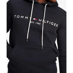 Stay comfortable and stylish with Tommy Hilfiger's Embroidered Logo Hoodie. Made with cotton, this fleece hoodie is designed for total comfort. Featuring the iconic Hilfiger signature logo and a convenient kangaroo pocket, this hoodie is the perfect addition to your wardrobe..Regular Fit: Tommy Hilfiger's Classic Pullover Hoodie made to fit comfortably..Size Medium Chest measures 44-1/2'.Model is wearing a size Medium.Drawstring hoodie for adjustable hood.Kangaroo pocket for added convenience.Cl Tommy Hilfiger Man, Drawstring Hoodie, Personal Shopping, Signature Logo, Hoodie Top, Fleece Hoodie, Kangaroo Pocket, Men's Clothing, Kangaroo