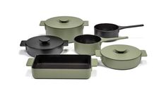 an assortment of pots and pans with lids