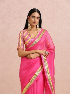 Featuring a fuschia silk organza saree with gota placements all over. It is paired with a fuschia chanderi blouse having gota and hand embroidery Color: Fuschia Pink Fabric: Sari - Organza Silk Blouse - Chanderi Note: Available in other colors The product will be shipped within 30-35 days of order placed Wash care - Dry Clean Only. Do not use heavy Iron Organza Silk Saree, Gota Work, Fuschia Pink, Organza Saree, Silk Organza, Pink Fabric, Free Giveaway, Silk Blouse, Silk Saree