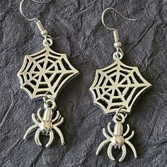 Spider Earrings- Halloween Earrings-Animal Earrings-Fashion Earrings Material: Alloy Diameter: 6.2 Cm Long X 2 Cm Wide New Without Tag Halloween Punk Style Single Earring, Punk Style Single Earring For Halloween, Gothic Earrings For Costume Party, Nickel-free Punk Halloween Earrings, Nickel-free Punk Earrings For Halloween, Punk Nickel-free Earrings For Halloween, Halloween Dangle Metal Earrings, Spooky Silver Dangle Earrings, Metal Dangle Earrings For Halloween