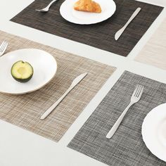 placemats with food and utensils on them