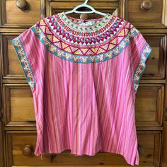 Heavily Embroidered Poncho Top. Fabric Is Heavier Weight. Nwt Spring Festival Embroidered Poncho, Spring Embroidered Pink Kaftan, Spring Pink Embroidered Kaftan, Folk Style Poncho With Floral Embroidery, Beach Multicolor Tops With Embroidered Hem, Bohemian Short Sleeve Poncho For Spring, Multicolor Embroidered Hem Top For Vacation, Bohemian Pink Embroidered Top For Vacation, Pink Bohemian Embroidered Top For Vacation