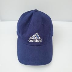 Trefoil Style With An Embroidered Logo In Front Relaxes, Six-Panel Crown With Curved Brim Adjustable Velcro At Back To Customize Fit One Size Fits All 100% Cotton Casual Adidas Logo Cap, Blue Sports Dad Hat With Embroidered Logo, Sporty Blue Dad Hat With Embroidered Logo, Adidas Navy, Accessories Brand, Accessories Branding, Adidas Women, One Size Fits All, Adidas Originals