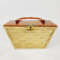 an old wooden box with leather handles on white background, showing the top part of it's lid