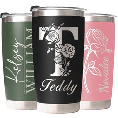 three personalized tumblers with flowers and the letter f on each one, in different colors