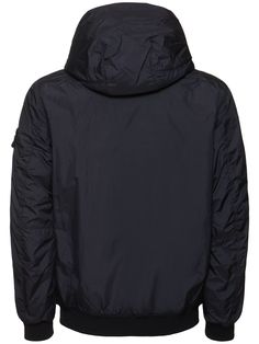 Non-detachable hood with drawstring. Front two-way zip closure. Ribbed cuffs and hem. Two side zip pockets. Synthetic padding. Model is wearing a sizeM Hooded Nylon Puffer Jacket With Ribbed Cuffs, Hooded Windbreaker With Padded Collar For Outdoor, Urban Nylon Windbreaker With Ribbed Cuffs, Hooded Nylon Track Jacket With Zipper, Hooded Nylon Windbreaker With Ribbed Cuffs, Hooded Windbreaker With Padded Collar, Urban Nylon Hoodie With Double-lined Hood, Nylon Hooded Jacket With Zipper For Streetwear, Urban Hooded Jacket With Padded Collar