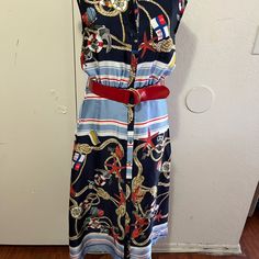 This Beautiful Nautical Dress Is Sleeveless, Buttons Down The Front, Is Unlined, Has Elastic In The Waist Front And Back, And Has A Red Belt. The Bust Is 36, The Waist.Is 26, The Hip Is 42, And The Length Is 46. This Dress Is New With Tags And Has No Blemishes. Nautical Dresses For Summer Vacation, Nautical Style Summer Vacation Dresses, Blue Nautical Spring Dresses, Spring Beach Nautical Dresses, Spring Nautical Beach Dresses, Zara Sleeveless Summer Dress For Beach, Zara Sleeveless Summer Beach Dress, Zara Summer Sleeveless Dress For Beach, Zara Summer Sleeveless Beach Dress