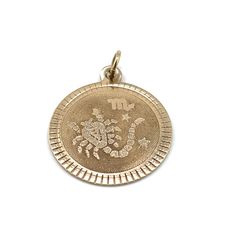 Vintage charm or pendant Style: Round disc with embossed Scorpio , Zodiac  Size: 19 mm by 19  mm tall (not including the loop/bail).   Material: 10 karat yellow gold  Weight: 1.5 grams Scorpio Zodiac, The Loop, Vintage Yellow, Vintage Charms, Charms, Accessory Gift, Gems, Yellow Gold, Electronic Accessories