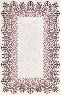 a white and red rug with an intricate design