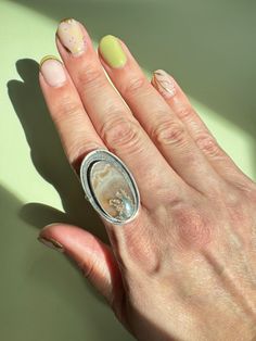 Prudent Man Plume on a patterned sterling silver ring band. Size 9 (might be able to fit a quarter to half size up) Silver Ring Band, Snake Ring Silver, Tourmaline Earrings, Snake Earrings, Sterling Silver Rings Bands, Snake Ring, Silver Band Ring, Pearl Chain, Ring Band