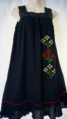 This is an Authentic Turkish hand sewed loose flowy women summer dress made with 100% cotton. Made from a special handmade garment in Turkey for over 150 years called "Sile Bezi".  + It's a short shoulder strap black dress with red and yellow Turkish flower motifs.  + For best fit please see below for fit measurements + Please note that the dress comes with special washing instructions. It's perfect for hot summer days. It's very light and airy. Can be dressed at the beach or casually during day Black Peasant Dress For Summer, Black Folk Style Beach Dress, Black Folk Style Summer Dress, Bohemian Cotton Sundress With Floral Embroidery, Folk Style Cotton Floral Print Dress, Folk Style Cotton Dress With Floral Print, Cotton Peasant Dress With Floral Embroidery, Black Folk Style Cotton Dress, Black Cotton Folk Dress