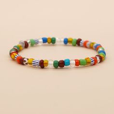 Material: Glass/Colored Glaze Color: GZ-B23072201A Fashion Element: Round, Polka Dot, Ring Style: Bohemian Color Rice, Colored Rice, Dot Ring, Rice Bead, Beads Handmade, Cross Border, Rainbow Color, Ring Style, Ethnic Style