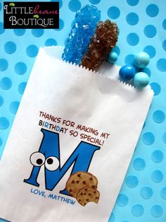 a paper bag with a cookie on it