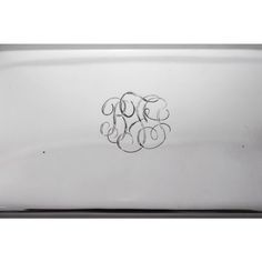 the monogrammed initials on this silver tray are handwritten