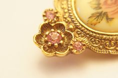 "Pretty vintage 90s shabby chic roses and pink rhinestone brooch costume jewelry in good shape. Measures : 2\" by 1\"" Vintage Pink Collectible Brooches, Bohemian Style Wedding Dresses, Boho Art Deco, Womens Designer Belts, Bohemian Style Wedding, Marcasite Ring, Designer Belt, Gift For Grandma, Rhinestone Brooches